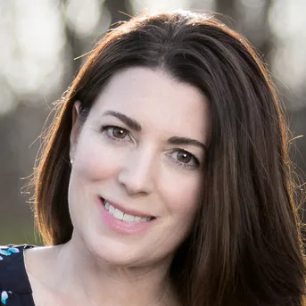 Headshot image of Kelly